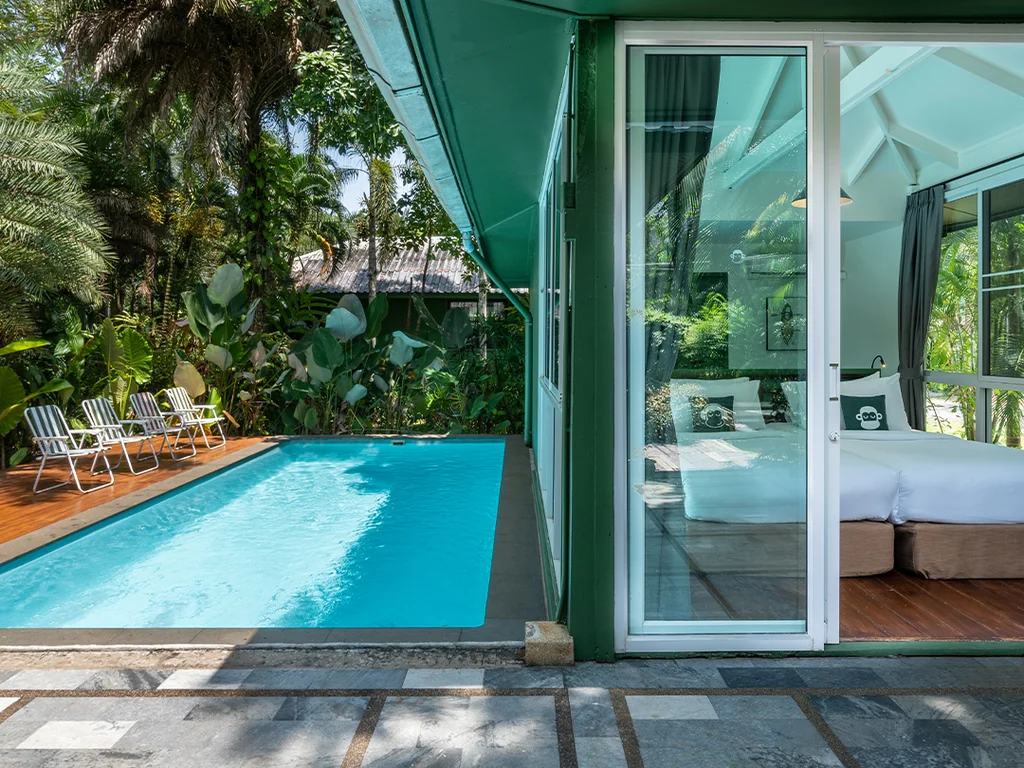 Bedroom opening onto a private pool at a two-bedroom pool villa at Blu Monkey Pooltara Krabi